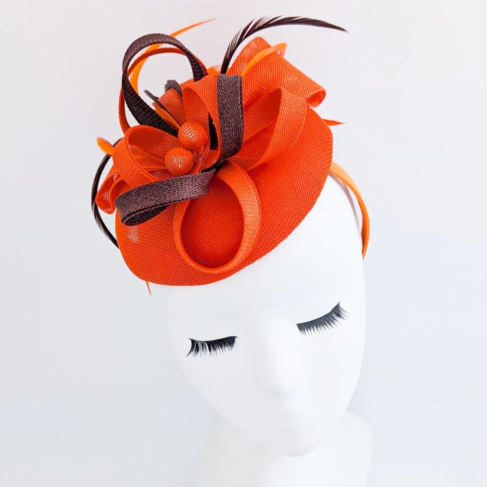 Orange brown feather fascinator disc saucer hat - House of Hats