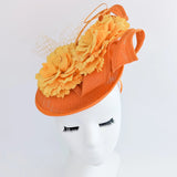 Orange flower fascinator disc saucer hat - House of Hats