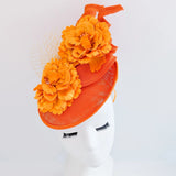 Orange flower fascinator disc saucer hat - House of Hats