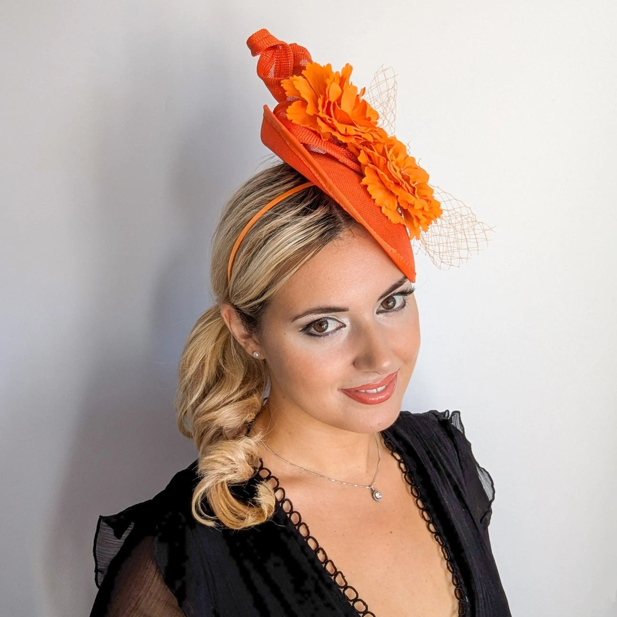 Orange flower fascinator disc saucer hat - House of Hats
