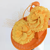 Orange flower fascinator disc saucer hat - House of Hats