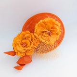 Orange flower fascinator disc saucer hat - House of Hats