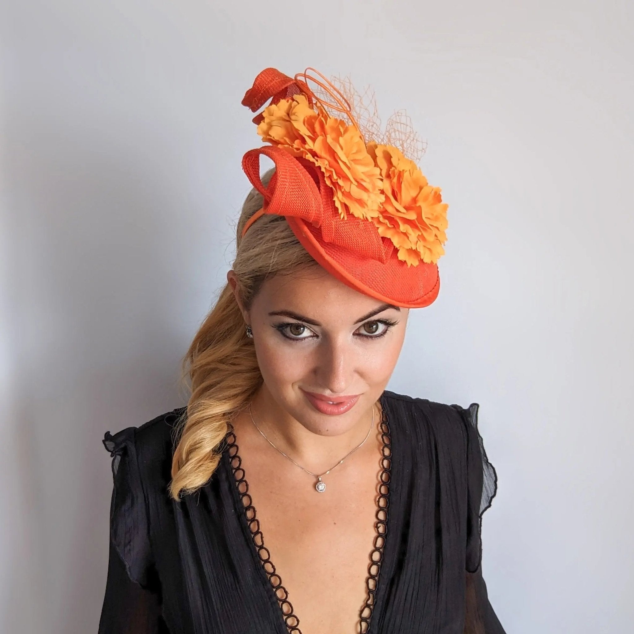 Orange flower fascinator disc saucer hat - House of Hats