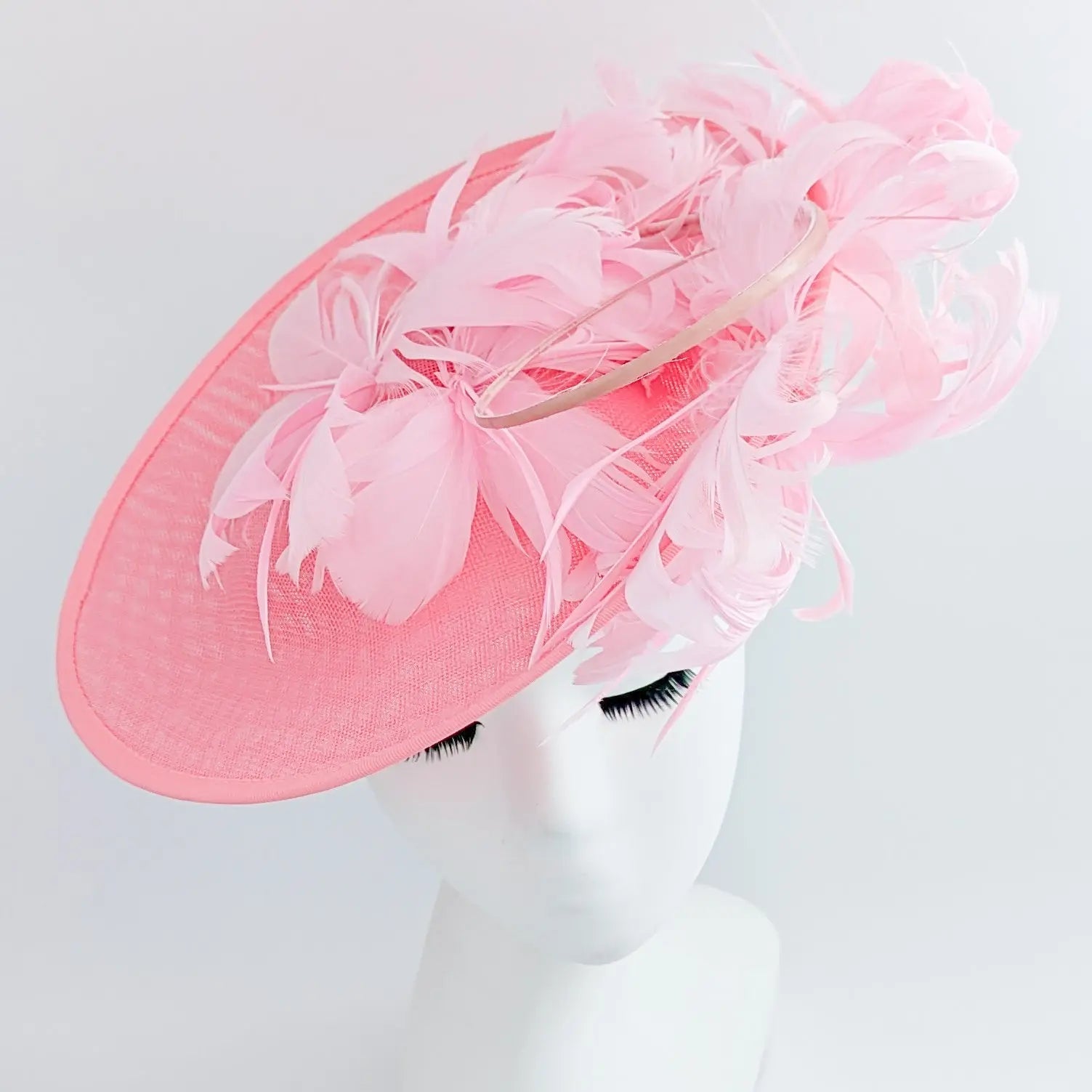 Pink large feather saucer disc fascinator hat - House of Hats