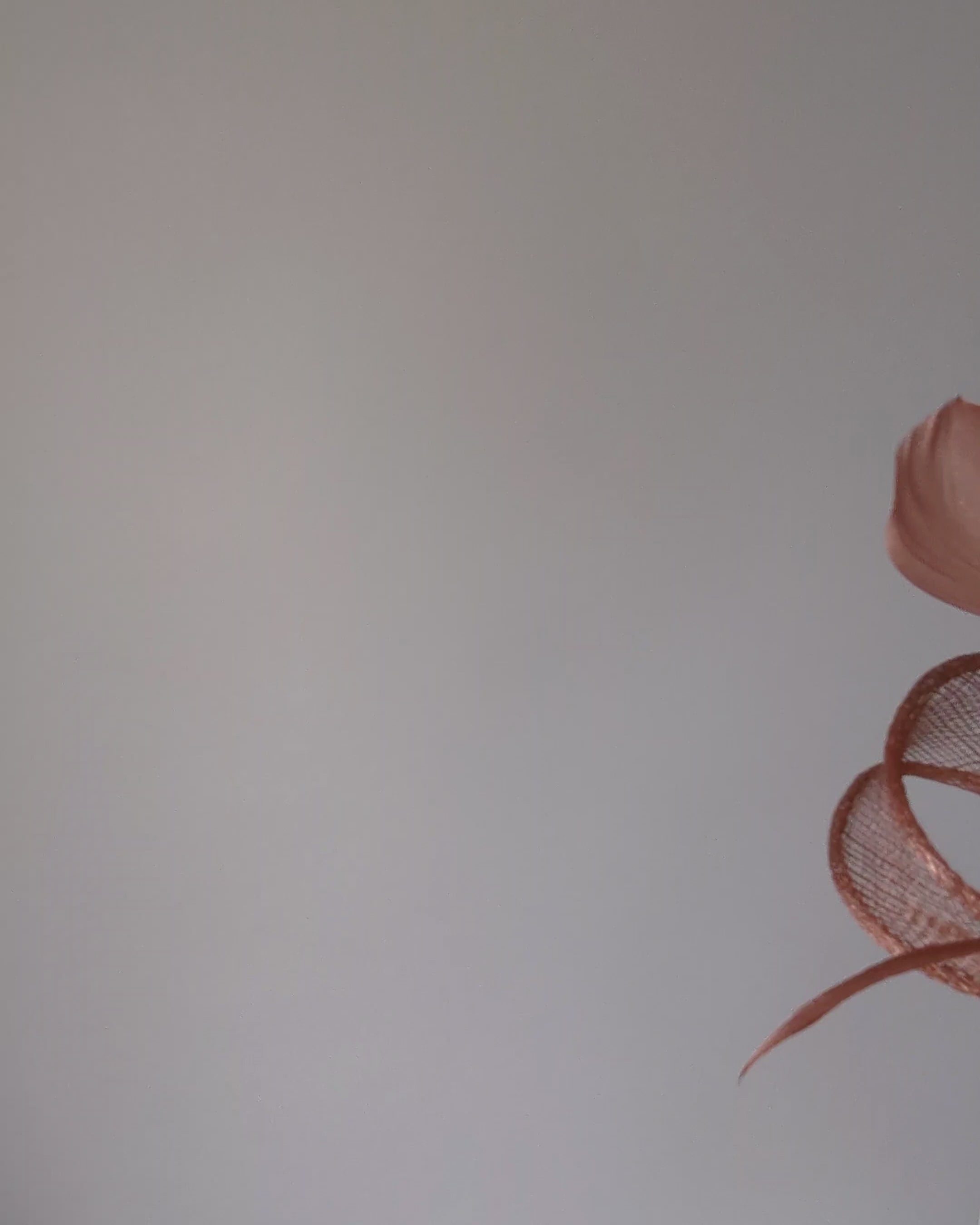 Rose gold shimmer feather fascinator hat