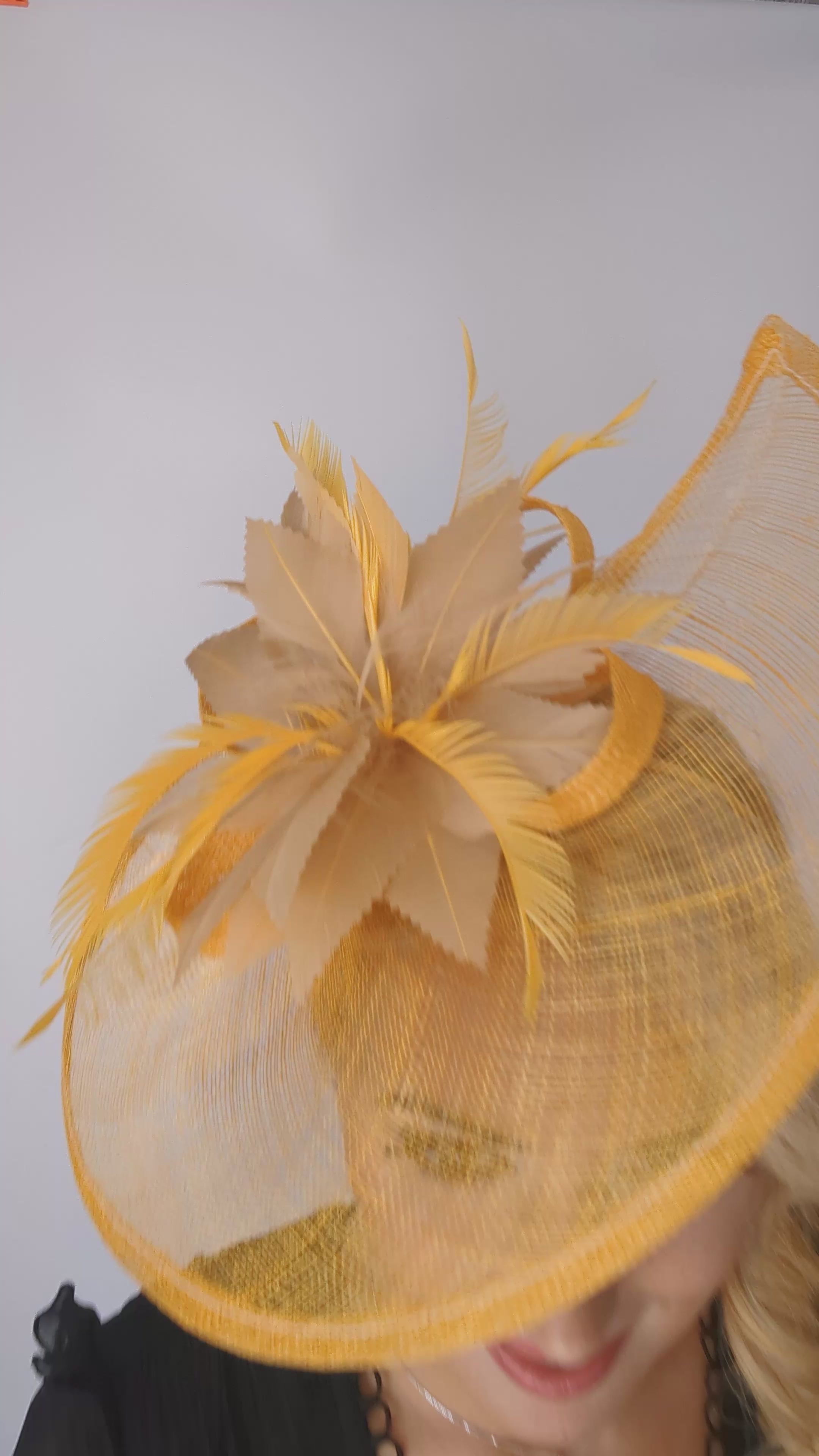 Golden yellow feather large teardrop fascinator hat