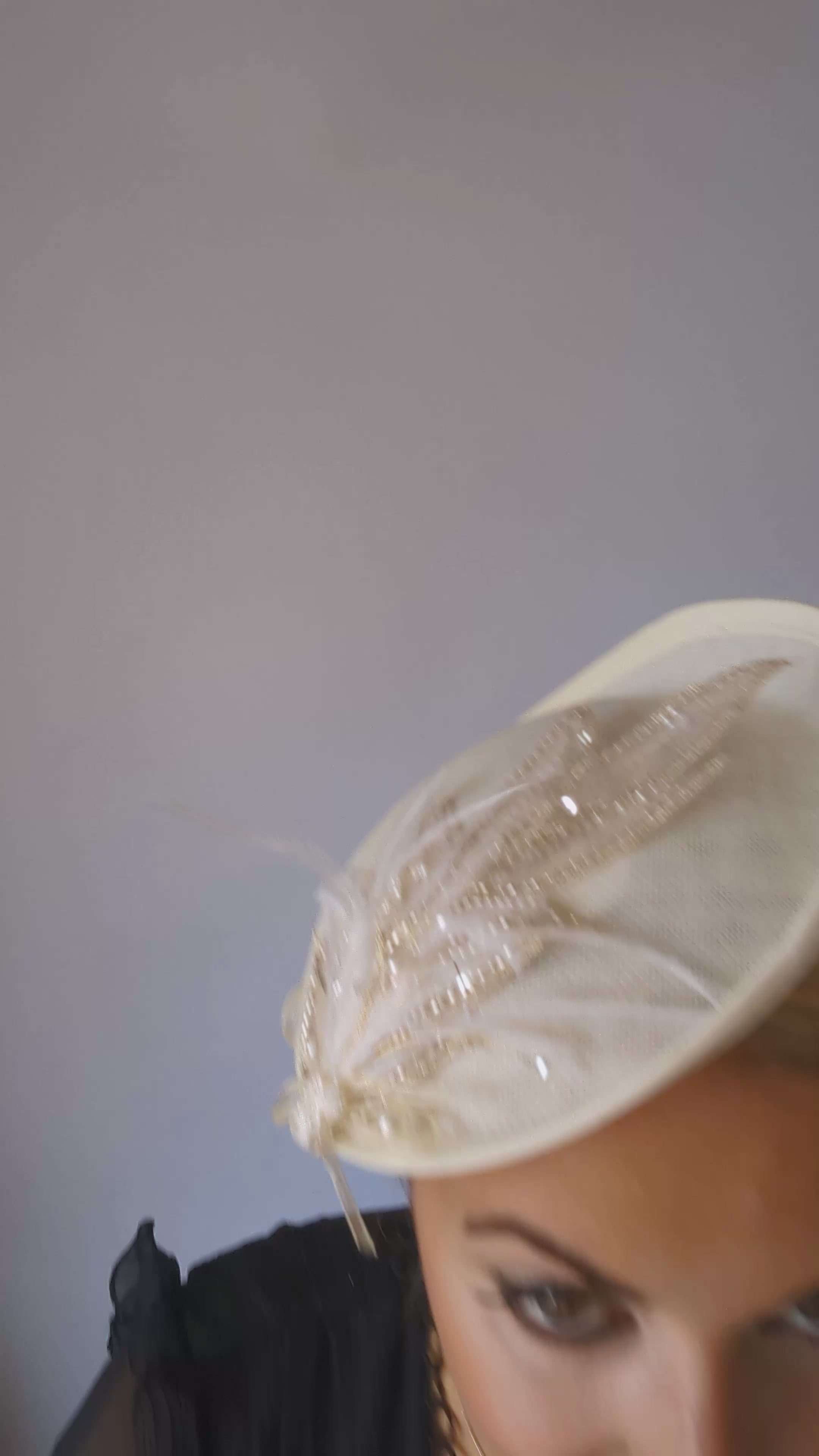 Cream crystal feather disc saucer fascinator hat