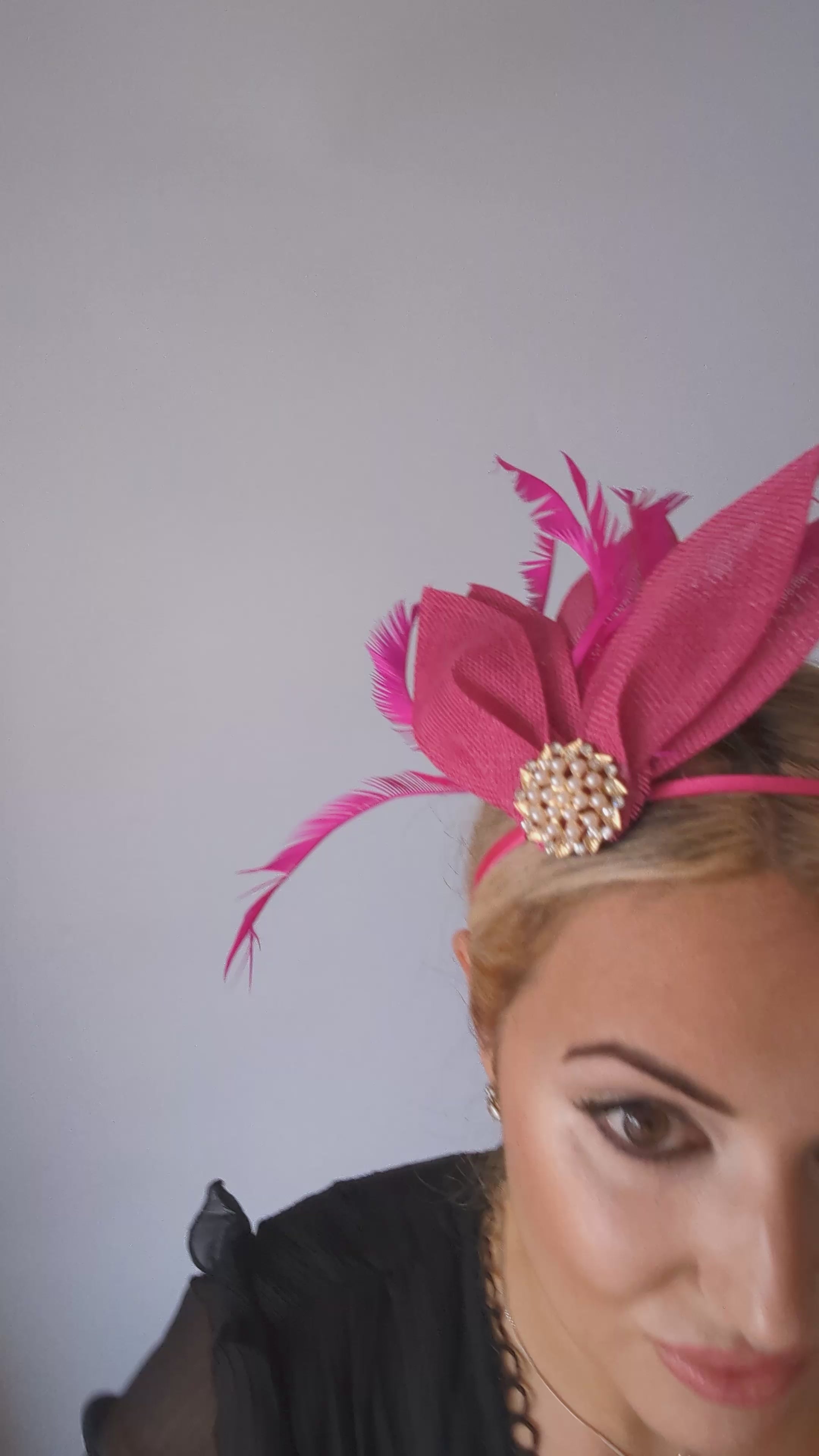 Fuchsia pink feather petal fan fascinator hat