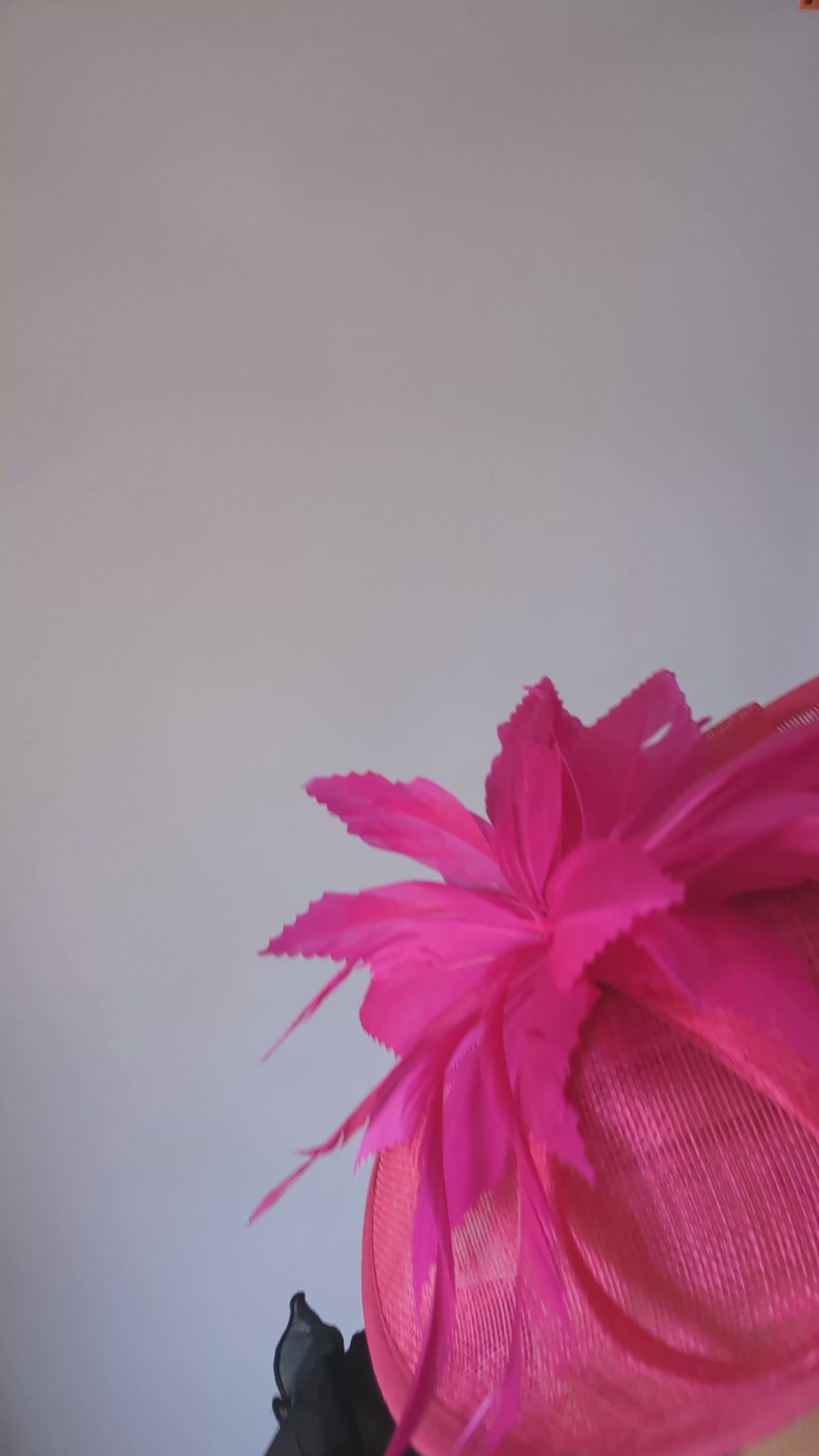 Fuchsia pink feather disc saucer fascinator hat