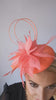 Coral orange feather fascinator hat