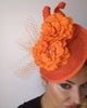 Orange flower fascinator disc saucer hat