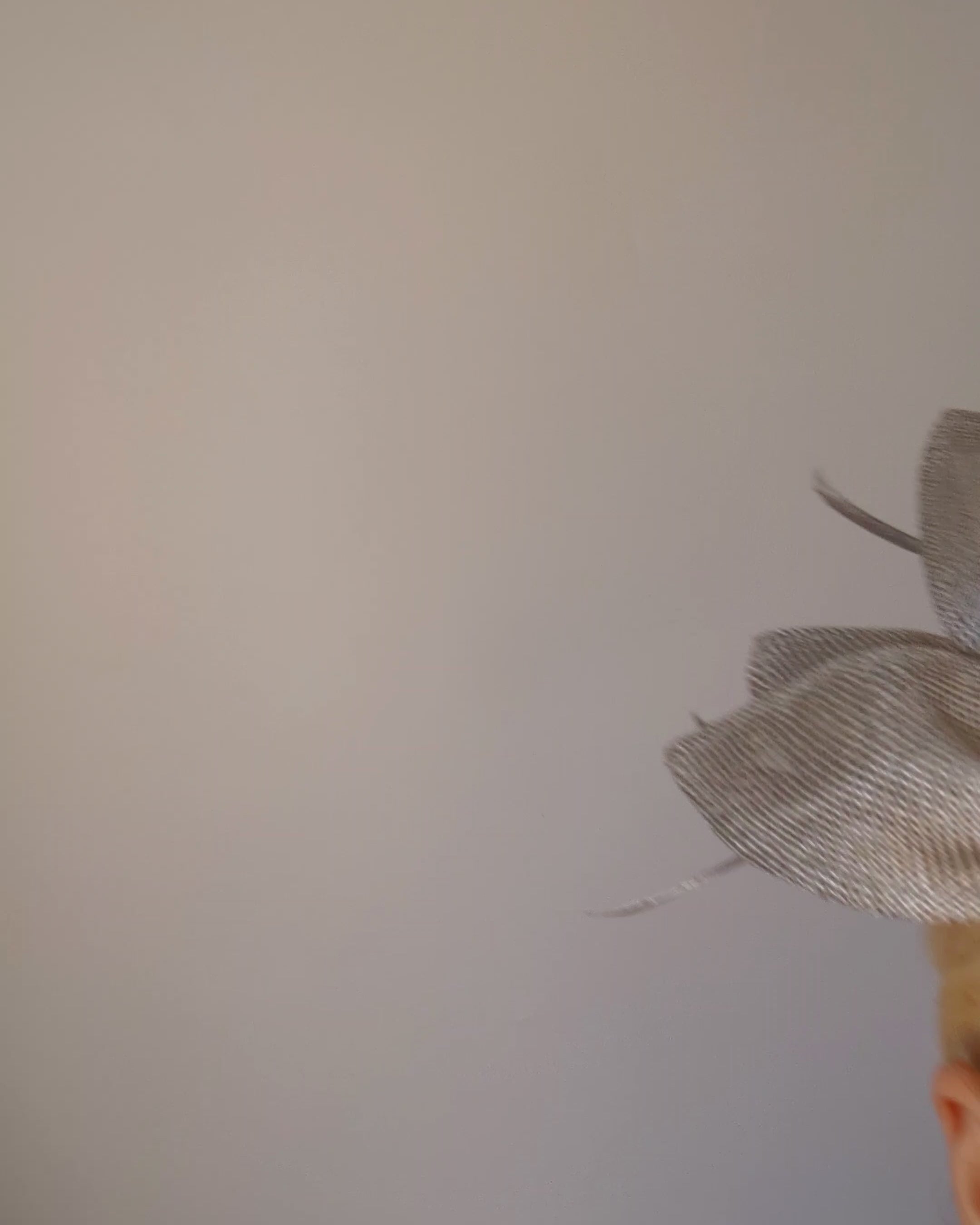 Silver shimmer feather petal fan fascinator hat