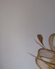Gold shimmer feather fascinator hat