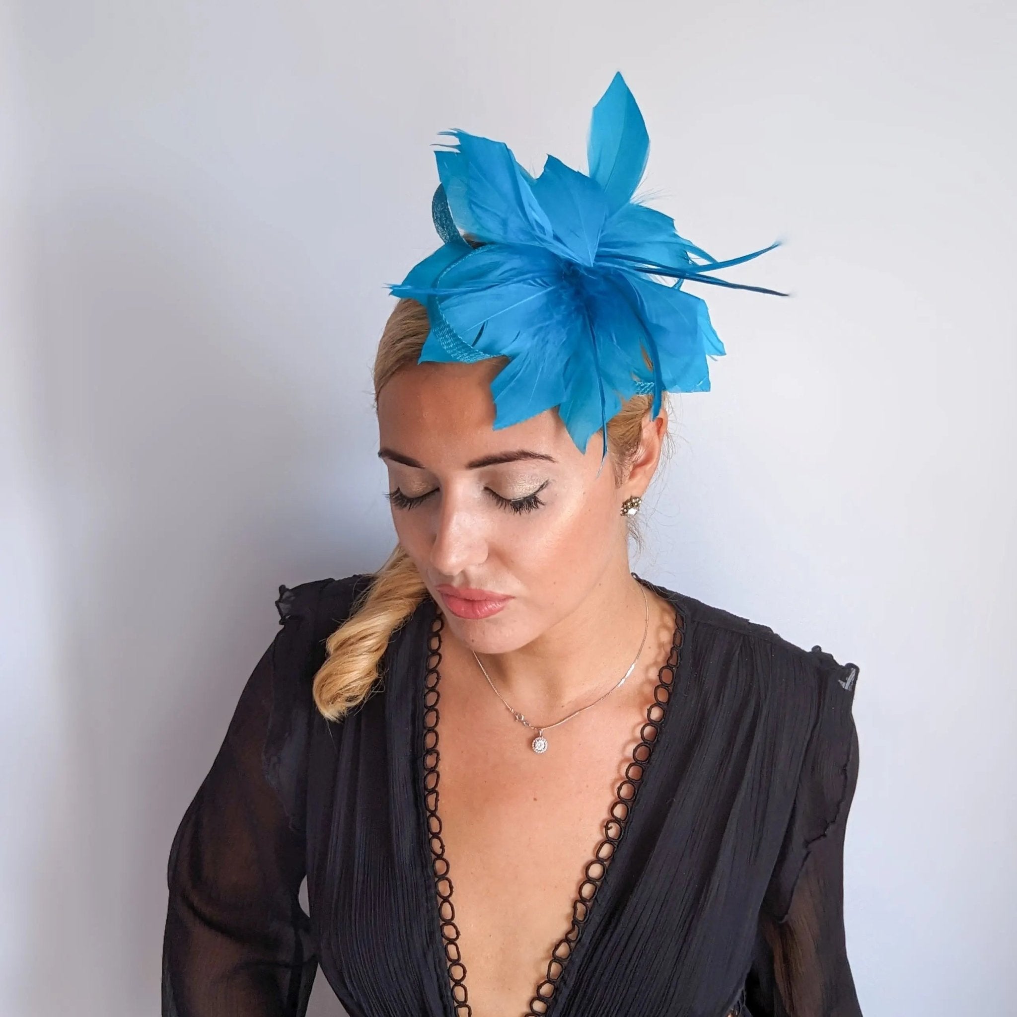 Sea blue feather fascinator hat - House of Hats