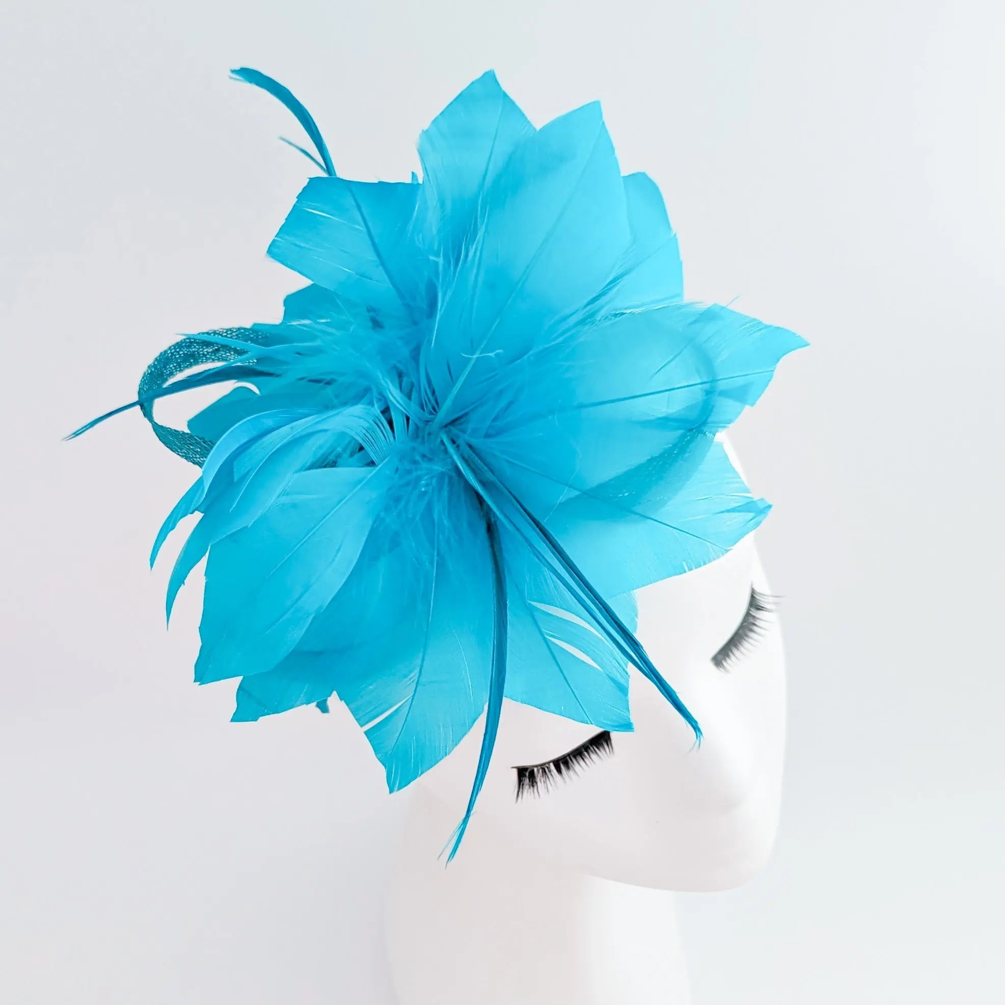 Sea blue feather fascinator hat - House of Hats