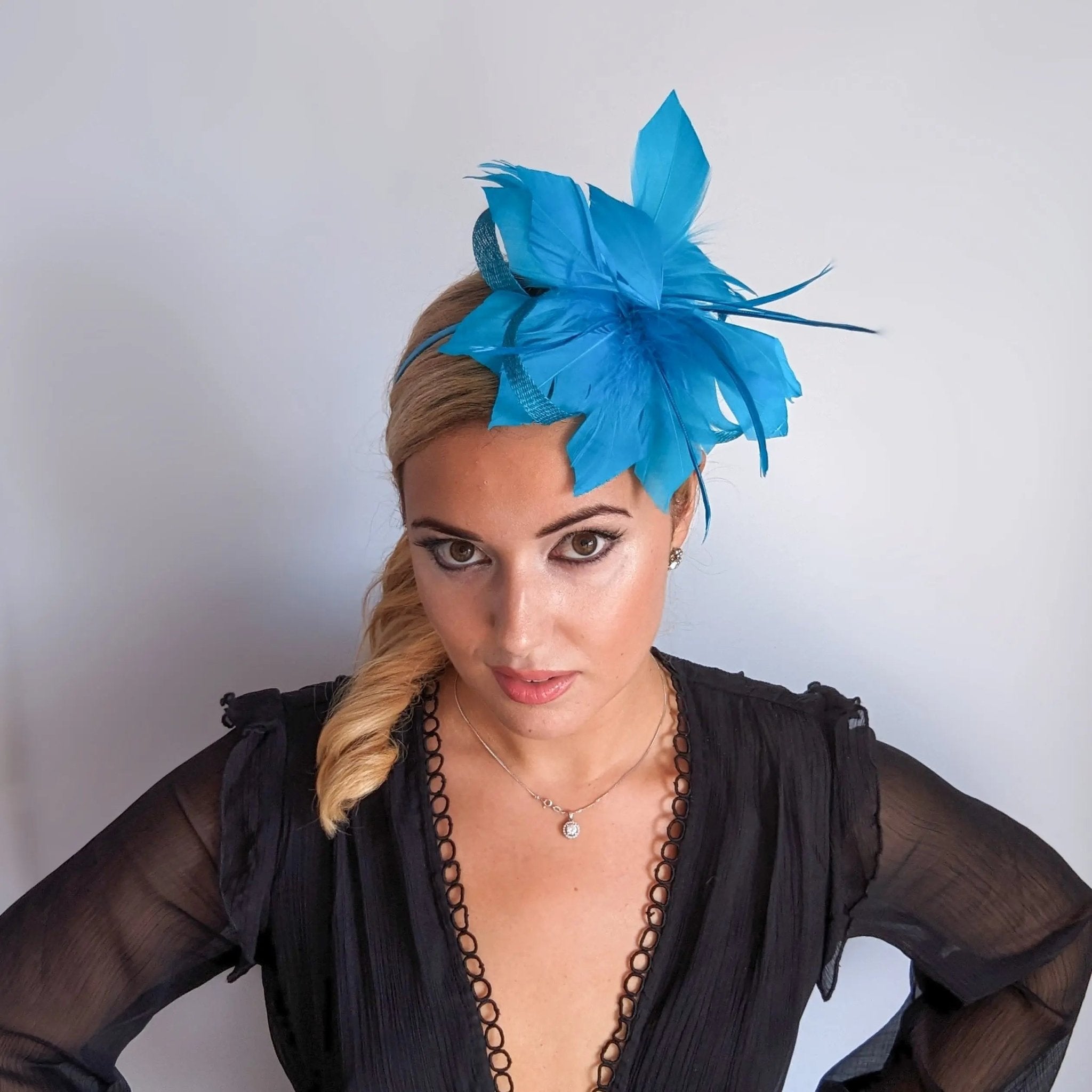 Sea blue feather fascinator hat - House of Hats