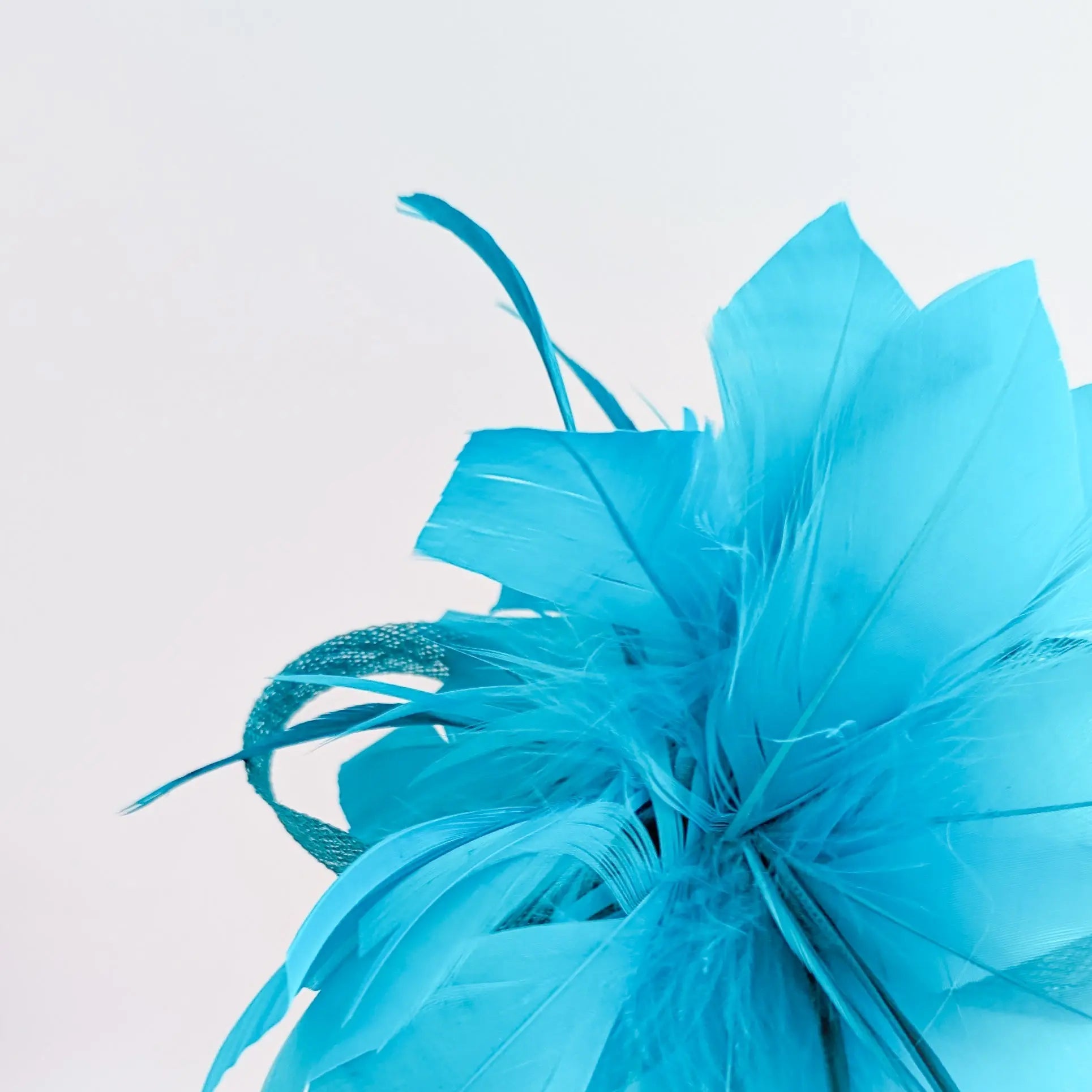 Sea blue feather fascinator hat - House of Hats