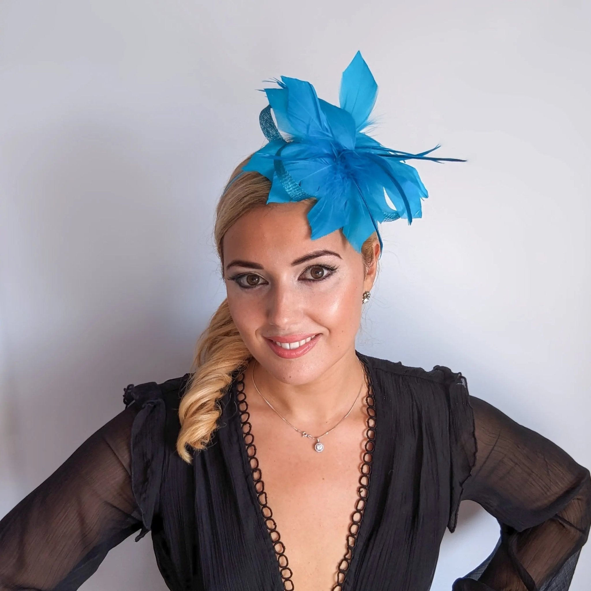 Sea blue feather fascinator hat - House of Hats