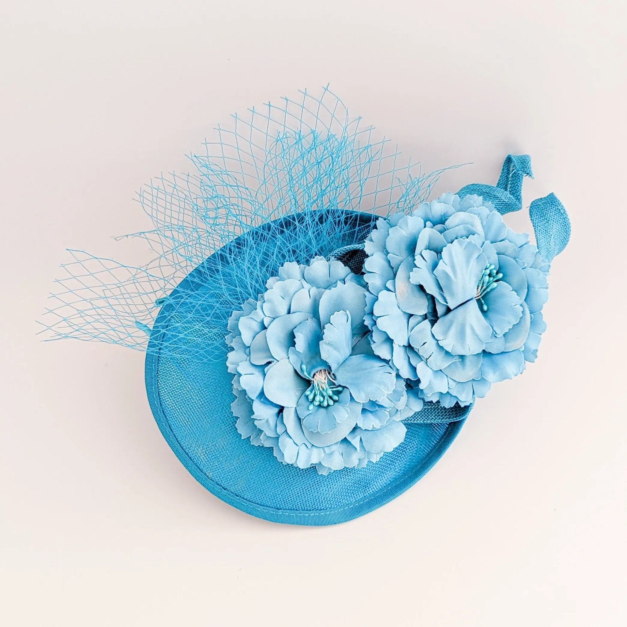 Sea blue flower fascinator disc saucer hat - House of Hats