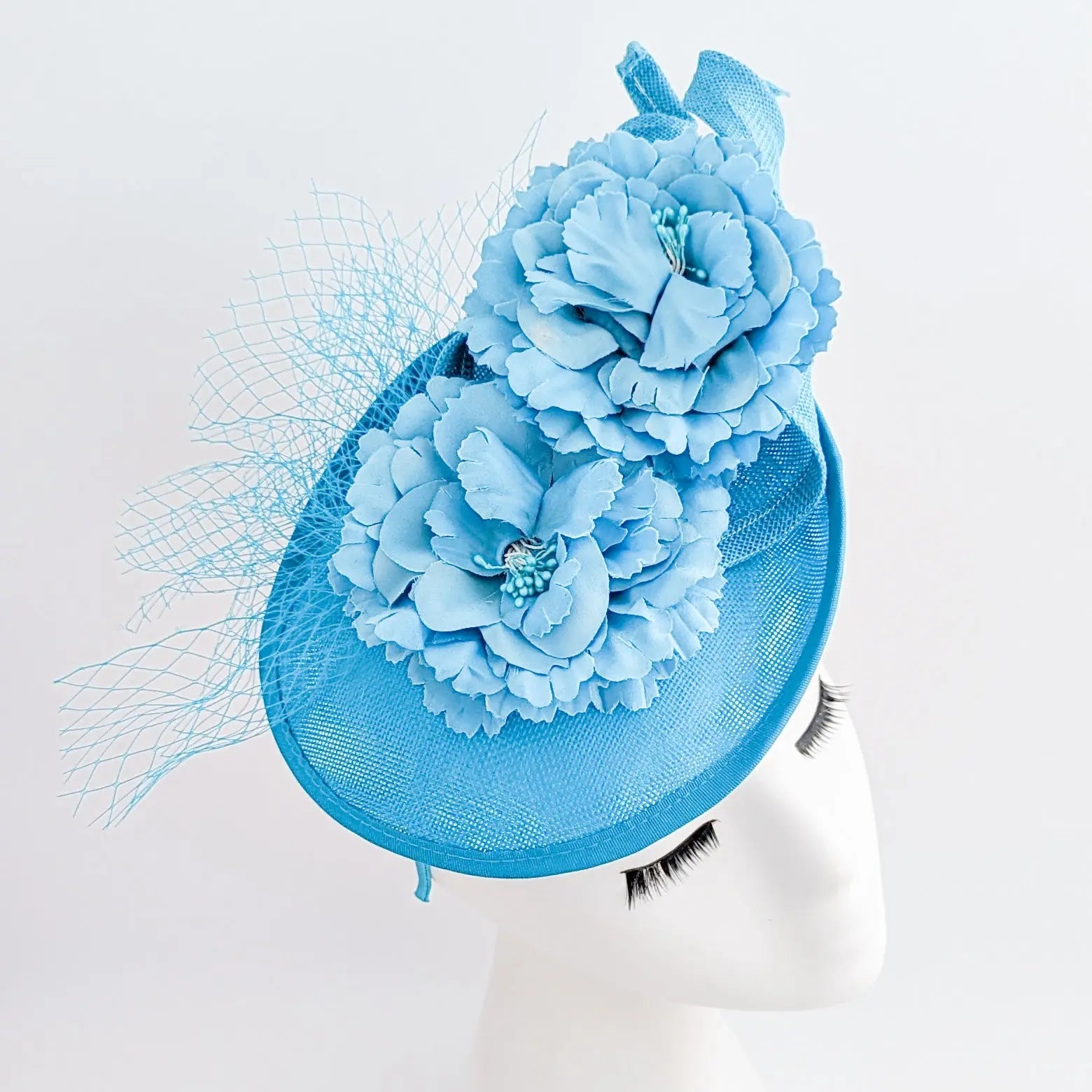Sea blue flower fascinator disc saucer hat - House of Hats