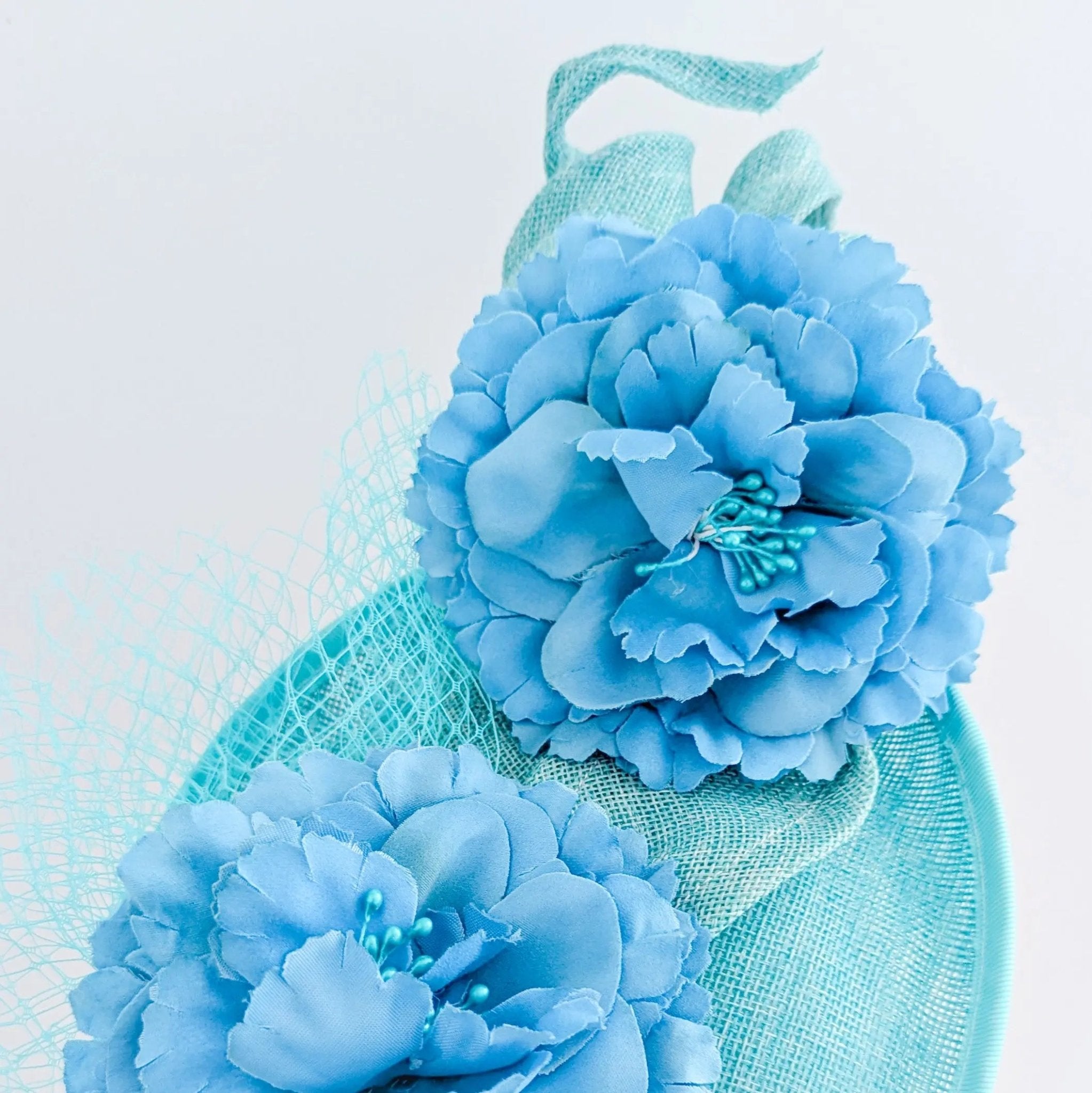 Seafoam mint green flower fascinator disc saucer hat - House of Hats