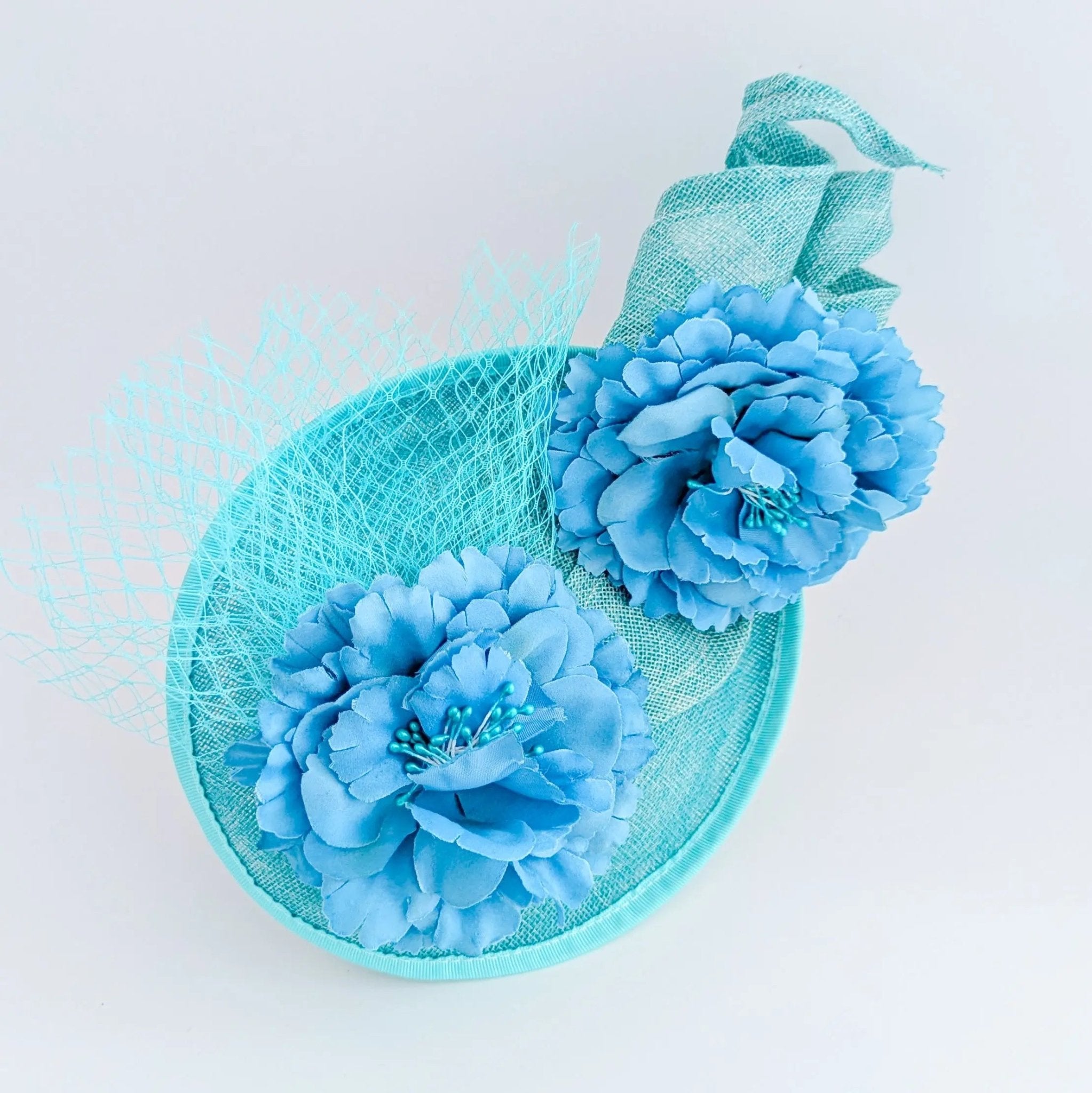 Seafoam mint green flower fascinator disc saucer hat - House of Hats