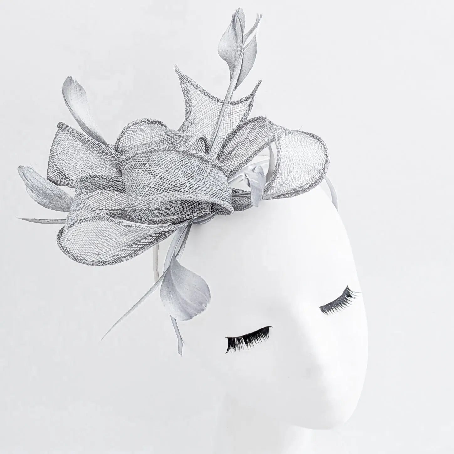 Silver shimmer feather fascinator hat - House of Hats