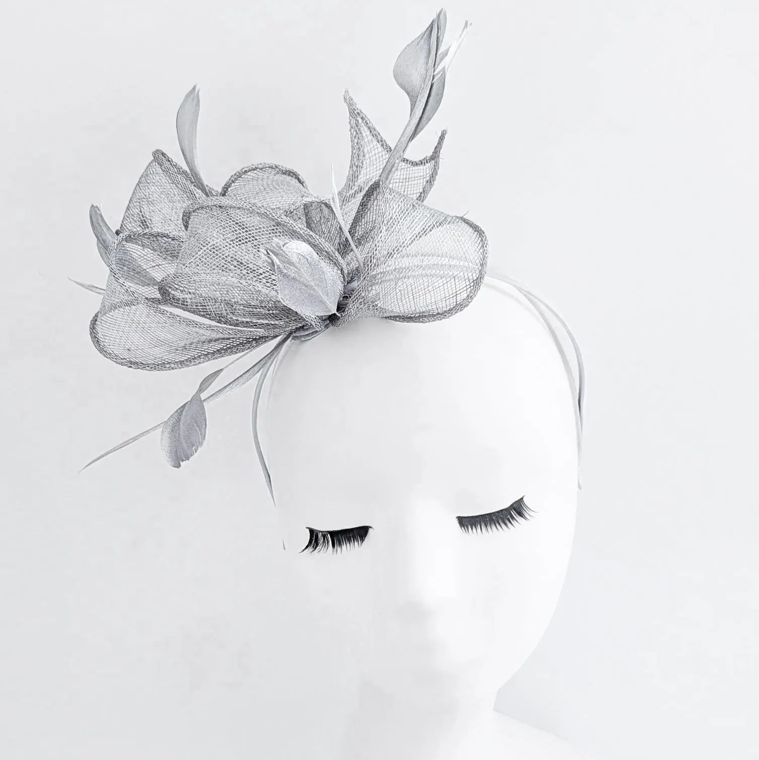 Silver shimmer feather fascinator hat - House of Hats