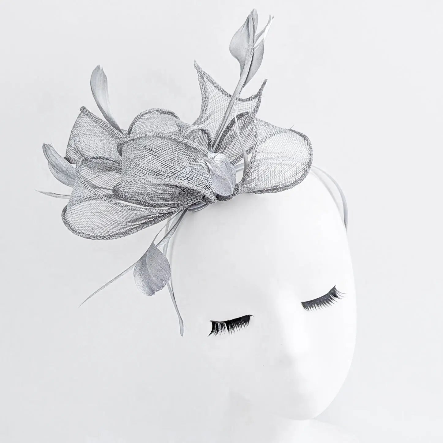 Silver shimmer feather fascinator hat - House of Hats