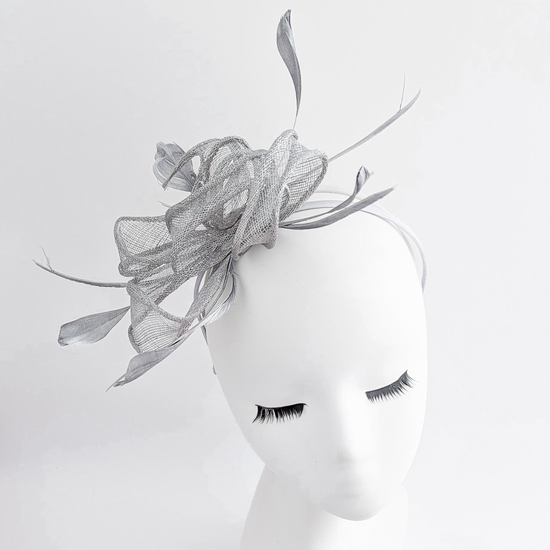 Silver shimmer feather fascinator hat - House of Hats
