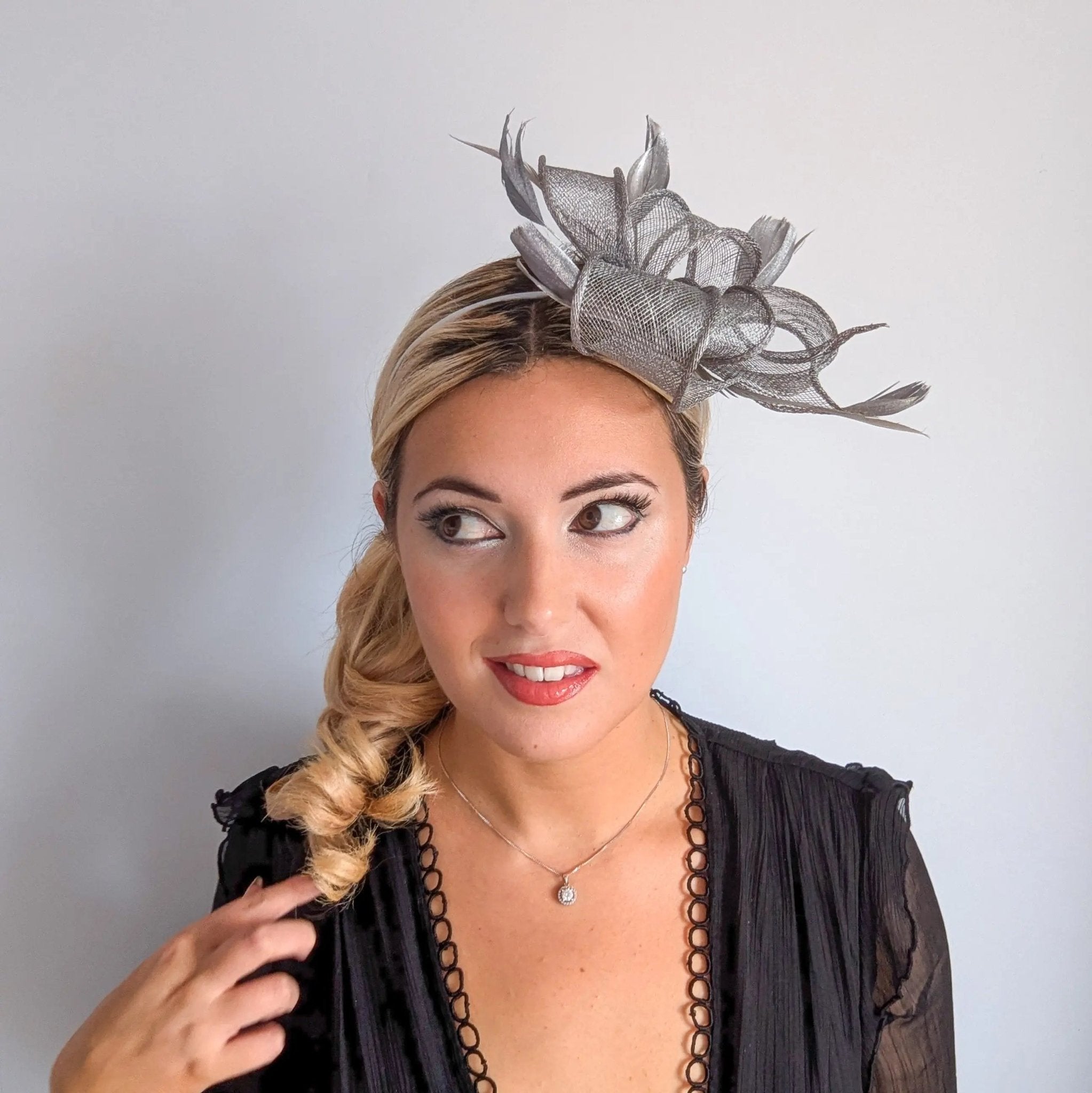 Silver shimmer feather fascinator hat - House of Hats
