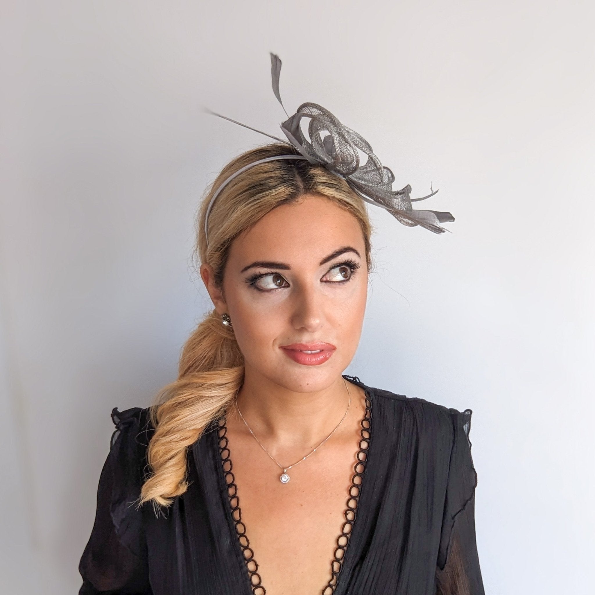 Silver shimmer feather fascinator hat - House of Hats