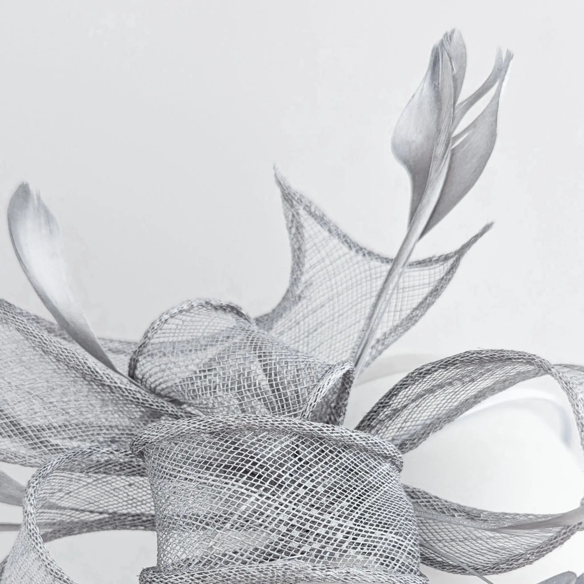 Silver shimmer feather fascinator hat - House of Hats