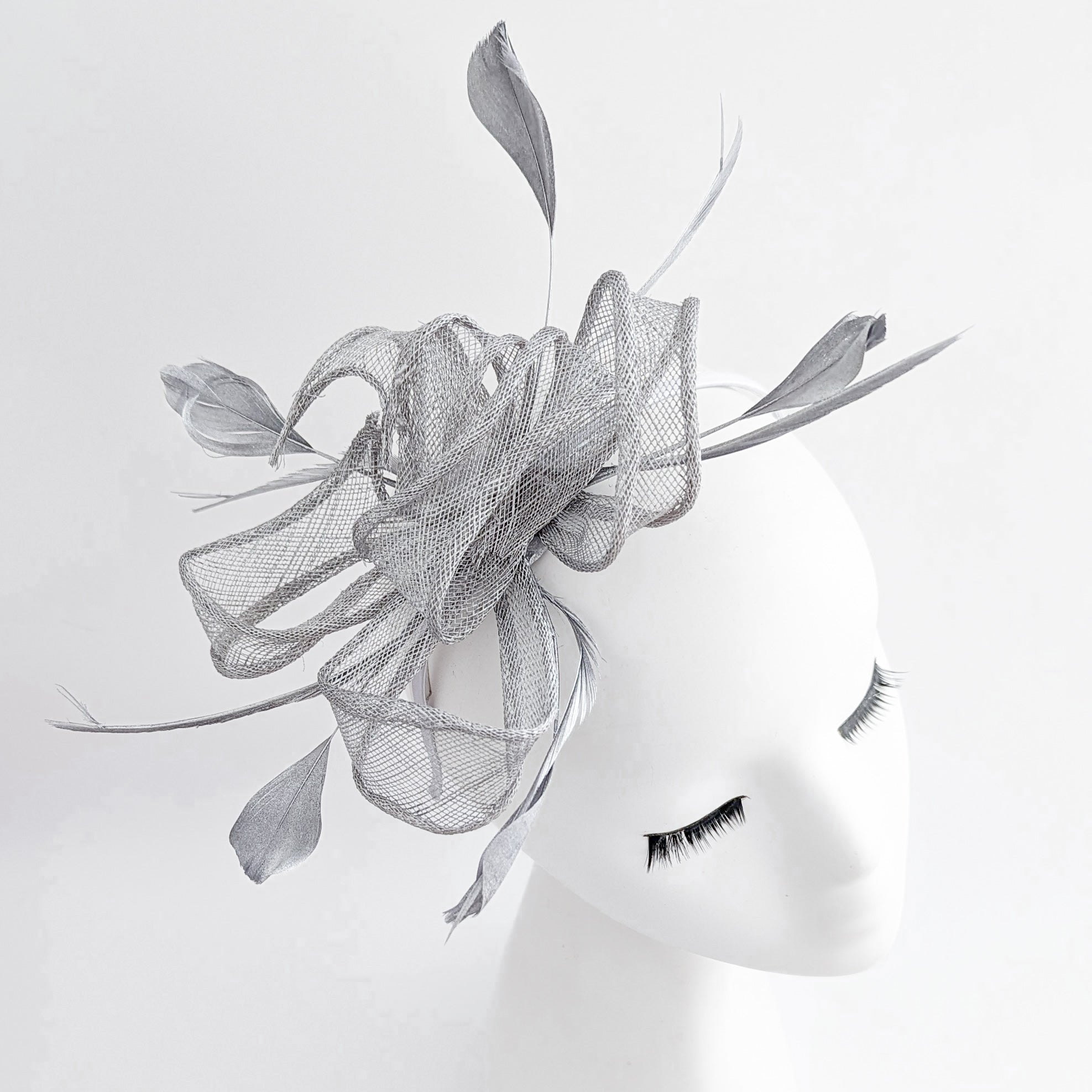Silver shimmer feather fascinator hat - House of Hats