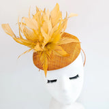 Tangerine orange feather fascinator hat - House of Hats