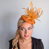 Tangerine orange feather fascinator hat - House of Hats