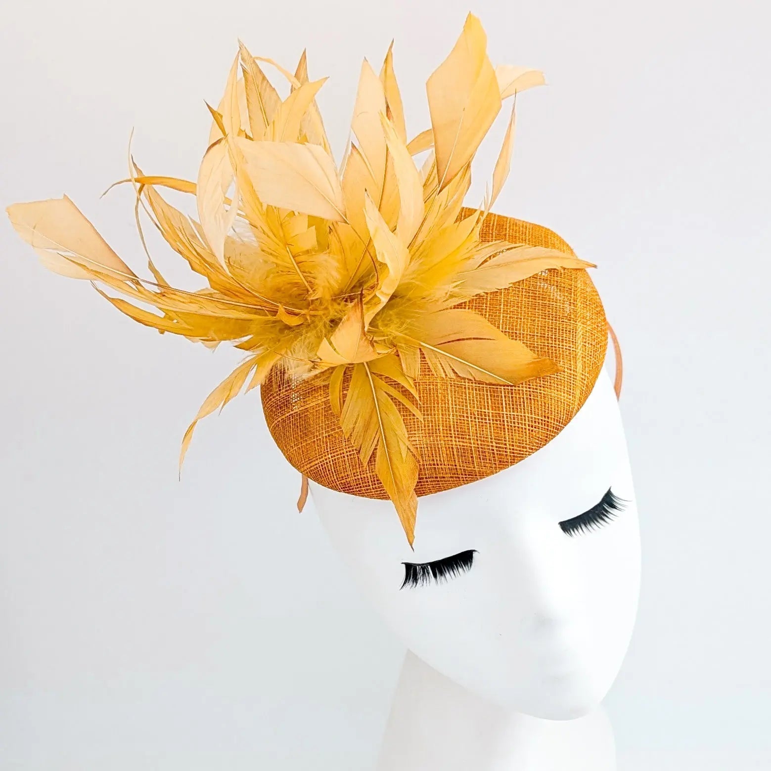 Tangerine orange feather fascinator hat - House of Hats