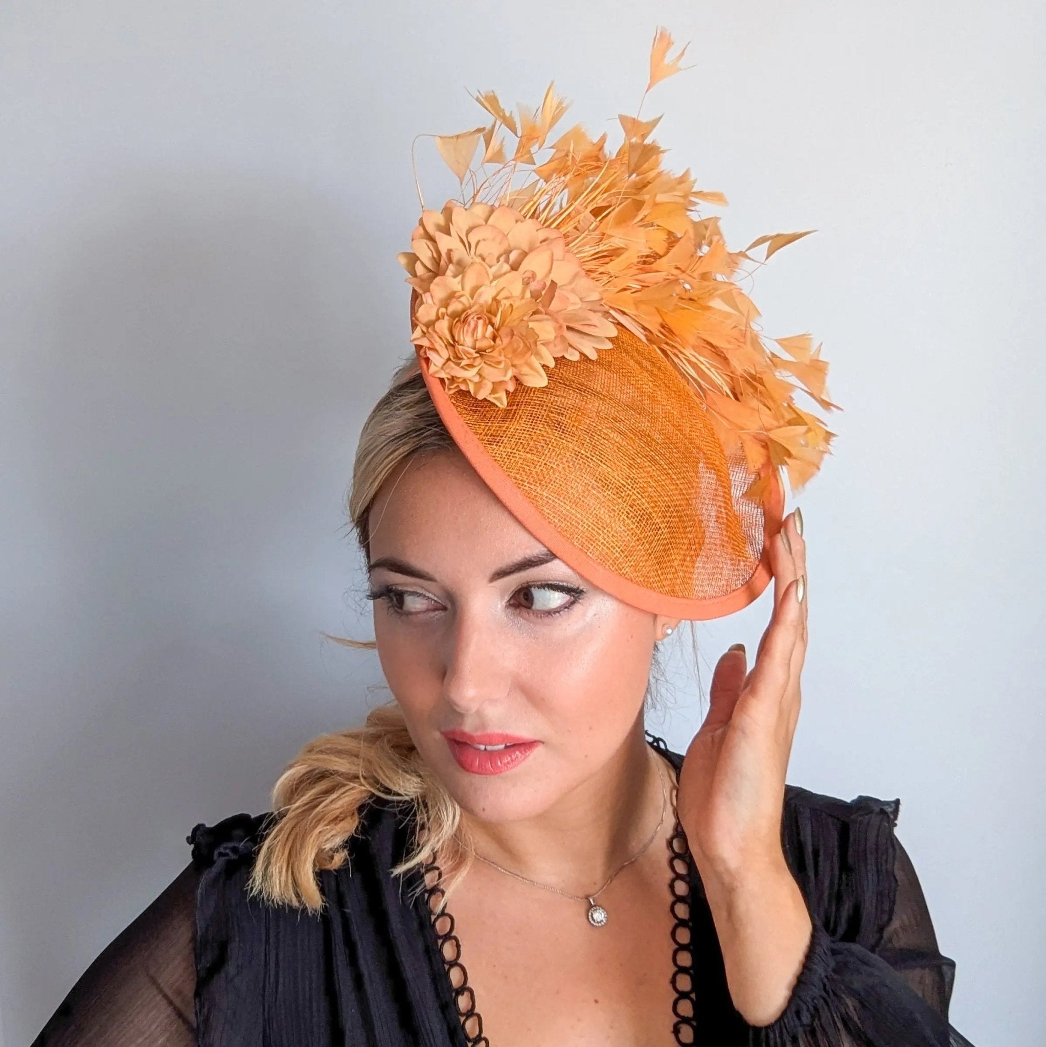 Tangerine orange flower feather disc fascinator hat - House of Hats