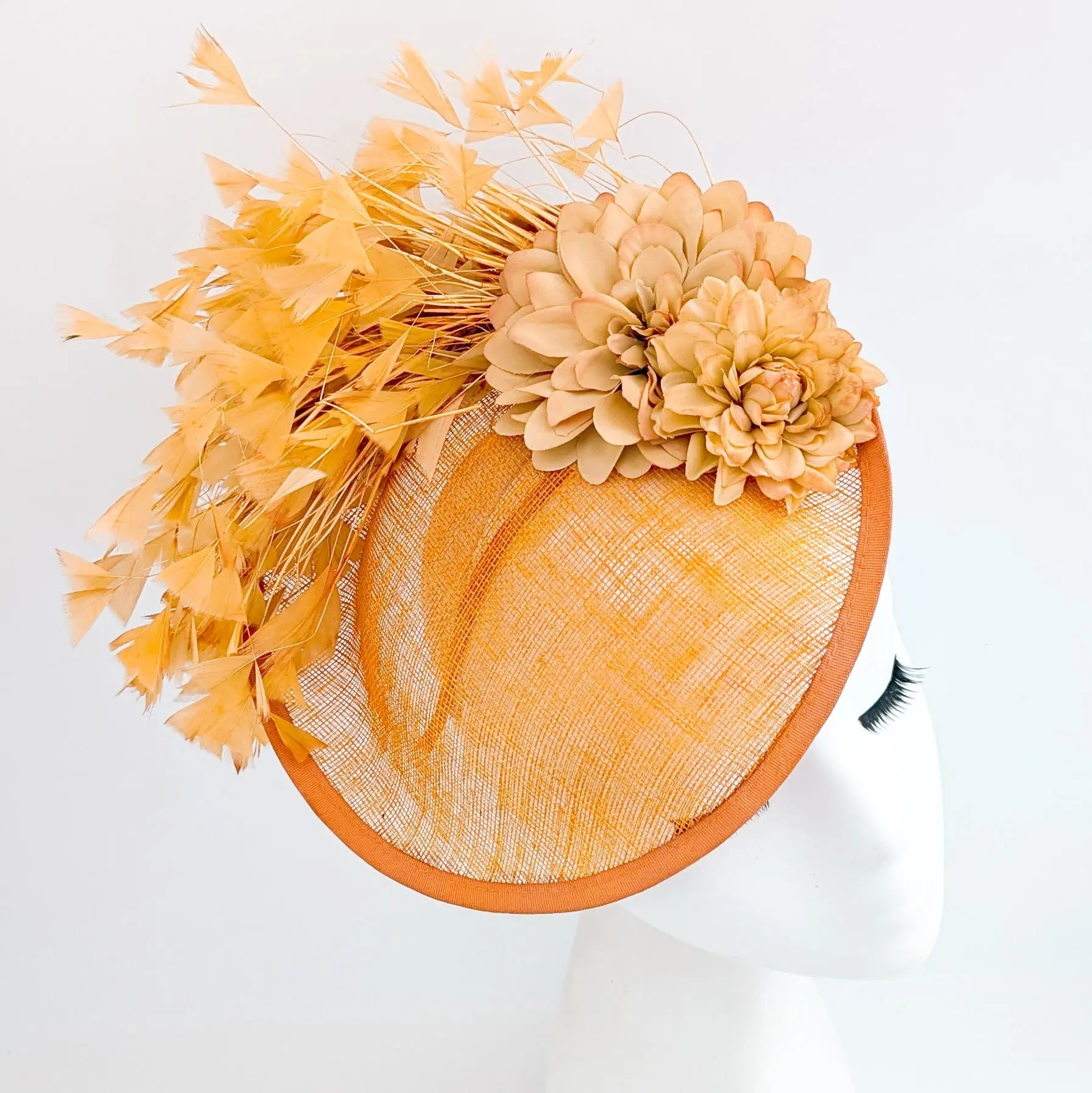 Tangerine orange flower feather disc fascinator hat - House of Hats