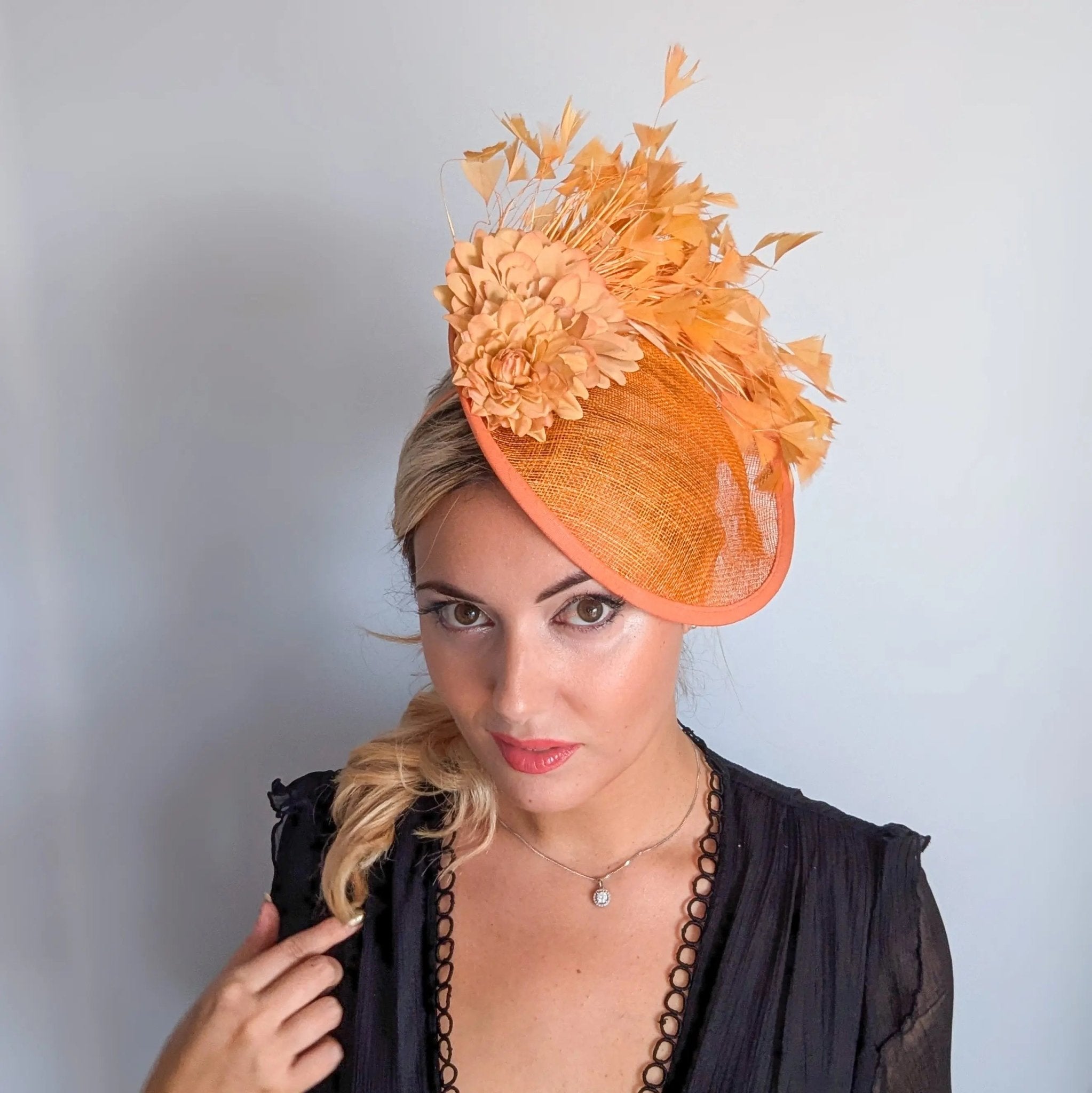 Tangerine orange flower feather disc fascinator hat - House of Hats