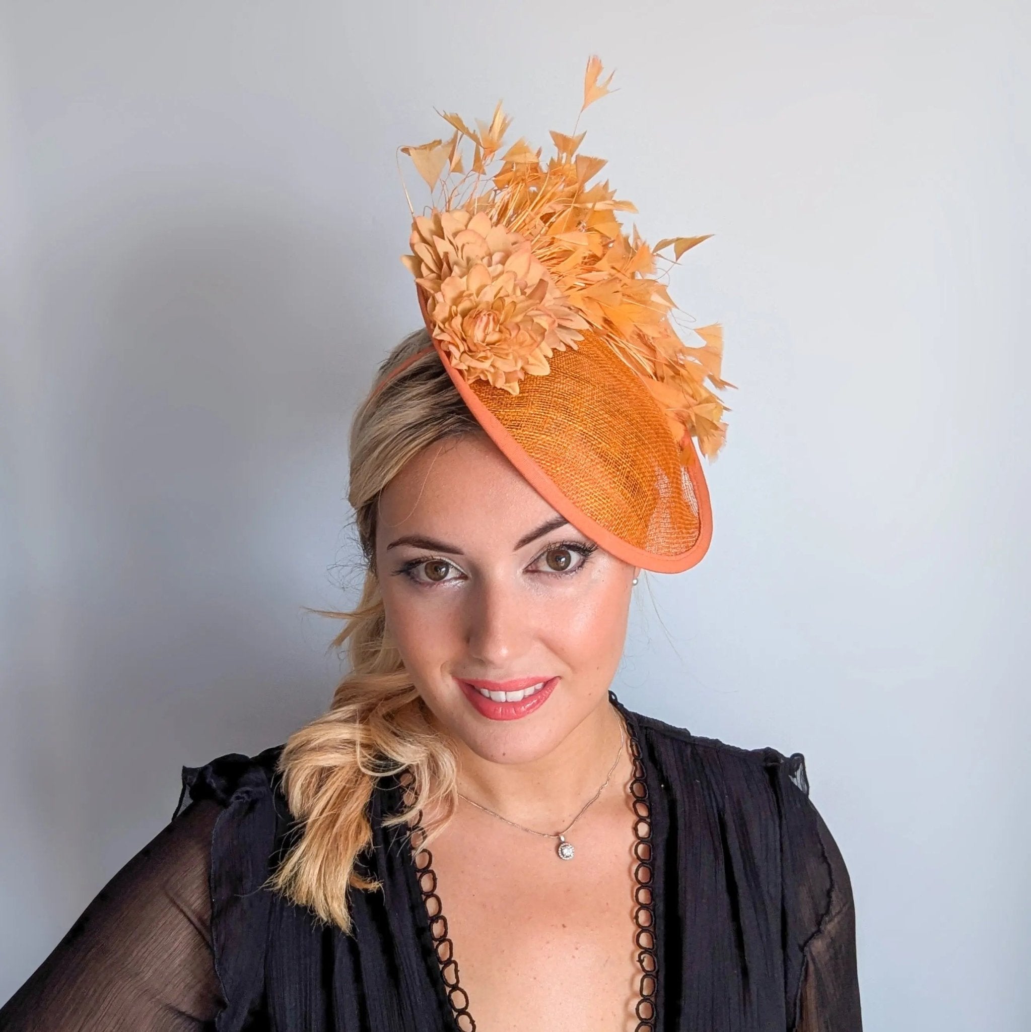 Tangerine orange flower feather disc fascinator hat - House of Hats