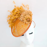 Tangerine orange flower feather disc fascinator hat - House of Hats