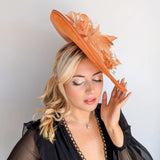 Terracotta dusty orange large feather oval disc fascinator hat - House of Hats