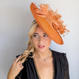 Terracotta dusty orange large feather oval disc fascinator hat - House of Hats