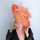 Terracotta dusty orange large feather oval disc fascinator hat - House of Hats