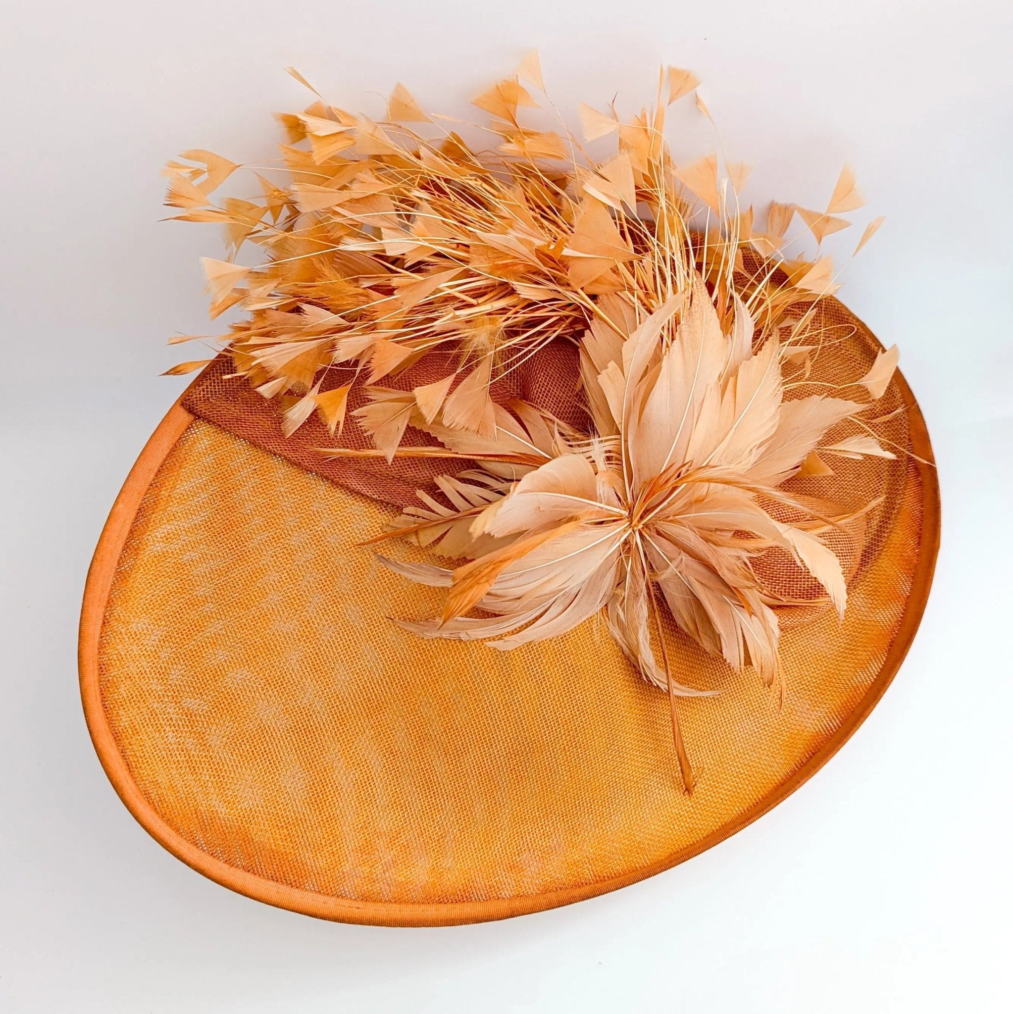 Terracotta dusty orange large feather oval disc fascinator hat - House of Hats