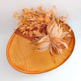 Terracotta dusty orange large feather oval disc fascinator hat - House of Hats