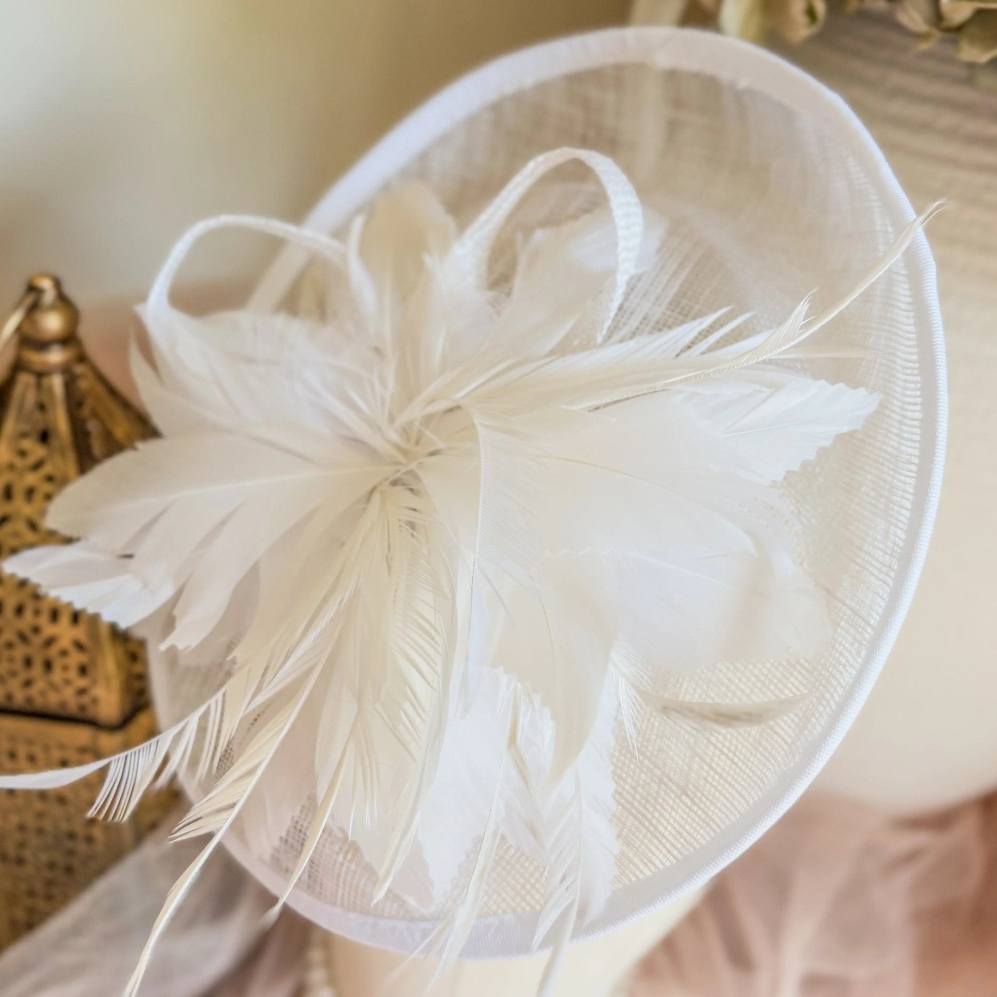 White disc fascinator hat with feathers - House of Hats