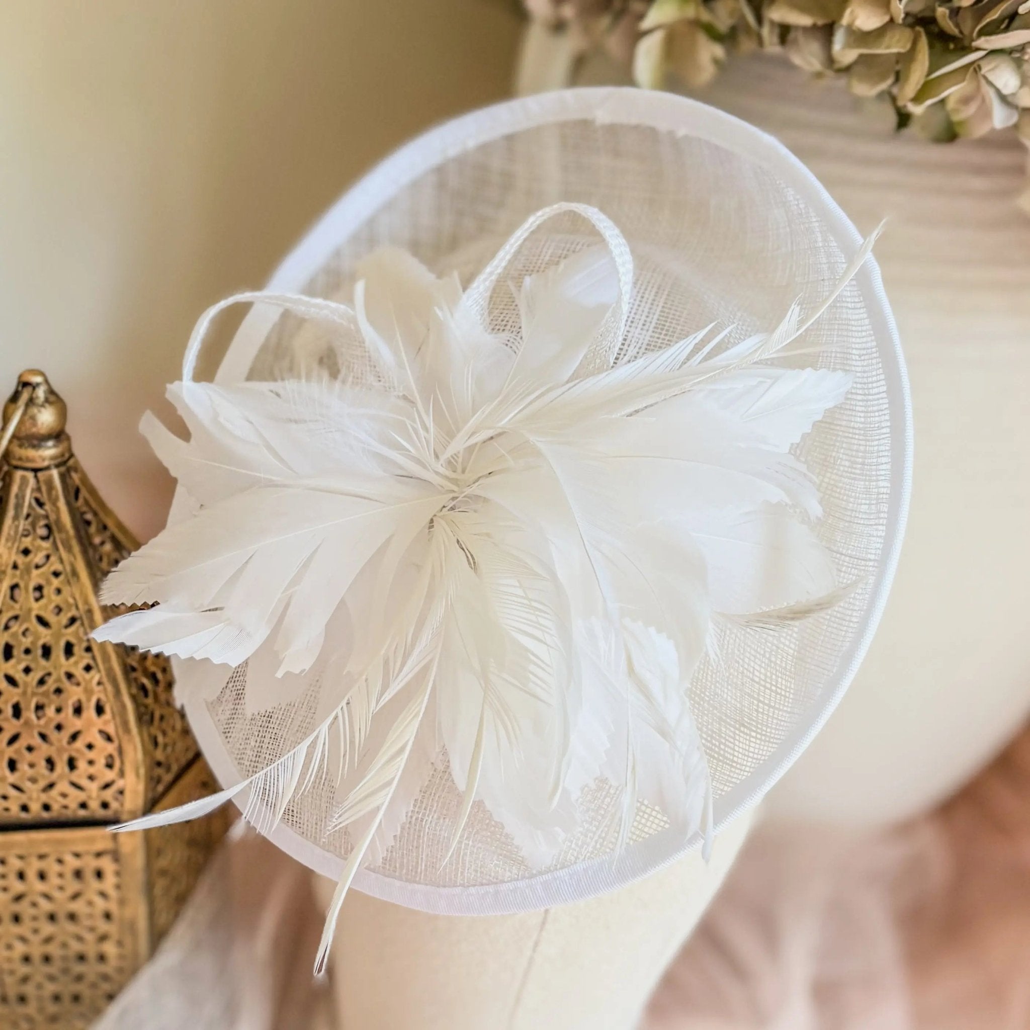 White disc fascinator hat with feathers - House of Hats