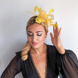 Yellow feather fascinator hat - House of Hats